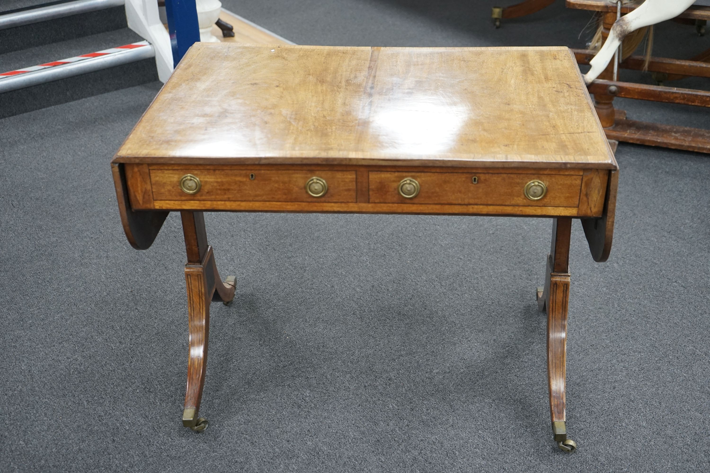 A Regency rosewood banded mahogany sofa table, width 91cm, depth 65cm, height 70cm